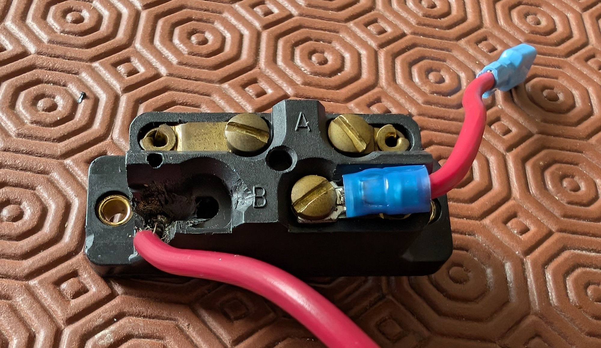 Switch showing broken corner and missing terminal