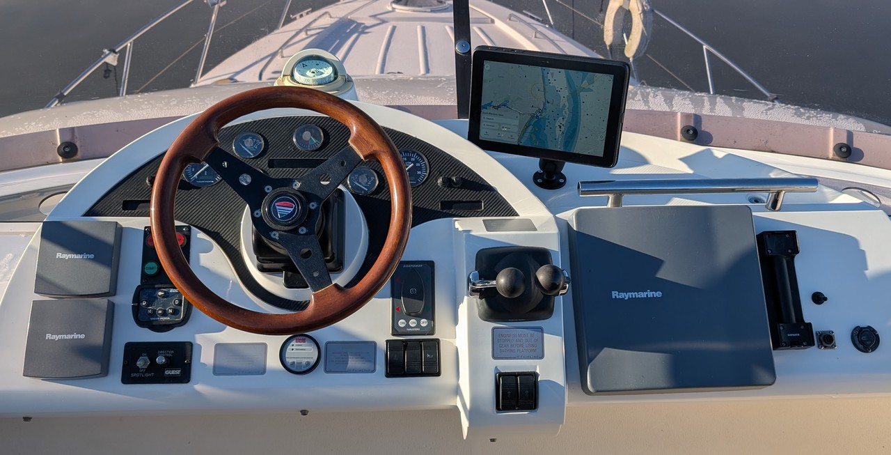 Orca Display 2 in Charging Mount at Upper Helm